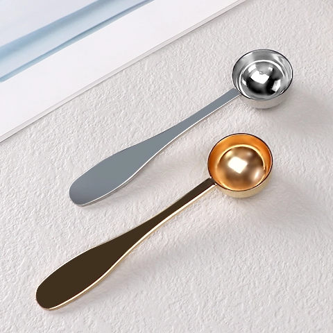 Gold stainless steel measuring spoon