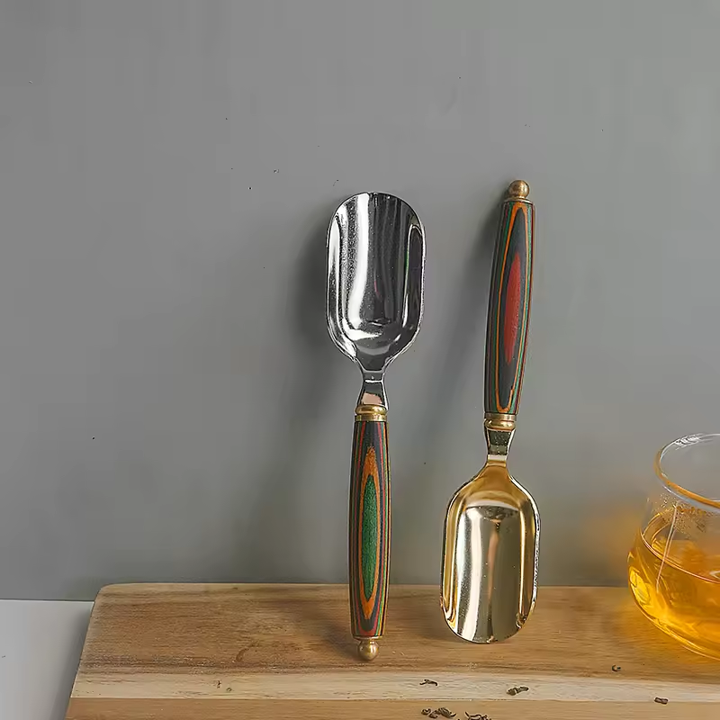 Stainless steel spoon with wooden handle