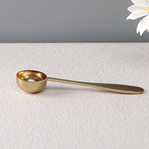 Gold stainless steel measuring spoon