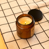 Brown glass candle cup