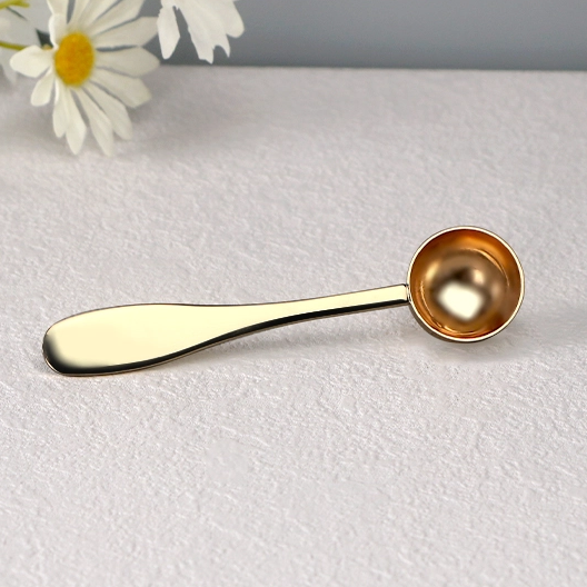 Gold stainless steel measuring spoon