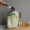 Stainless steel spoon with wooden handle
