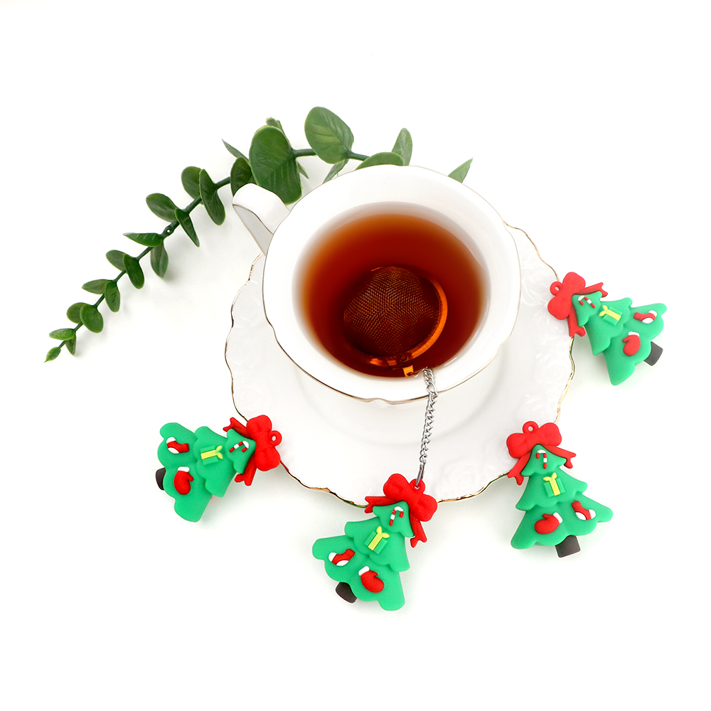 Tea strainer with Christmas pendant