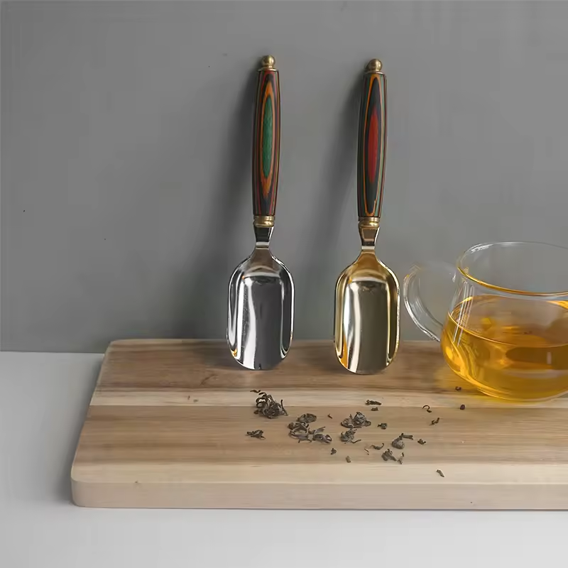 Stainless steel spoon with wooden handle