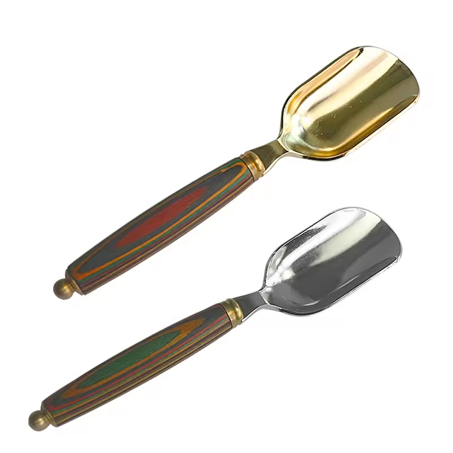 Stainless steel spoon with wooden handle