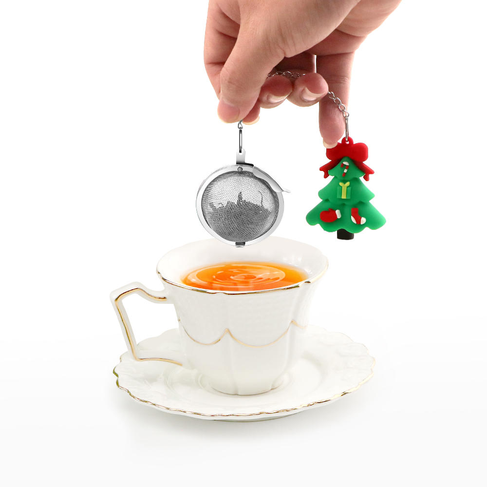 Tea strainer with Christmas pendant
